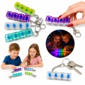 KLIKAJKA KLIKACZ KLAWIATURA ŚWIECĄCA ANTYSTRESOWY BRELOK FIDGET KLIKER 4 KLAWISZE