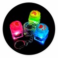 ŚWIECĄCY KLIKACZ ANTYSTRESOWY ŁAPKI BRELOK FIDGET KLIKER 1 SZT LED